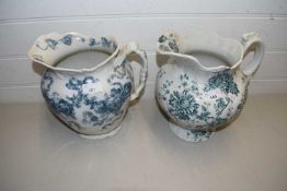 Two patterned wash jugs