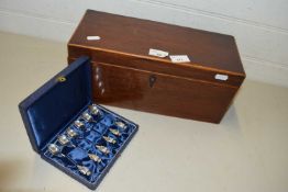 19th Century mahogany tea caddy together with a case of crested spoons