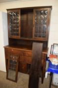 Late 19th/early 20th Century oak dresser cabinet with lead glazed top section and a base with four