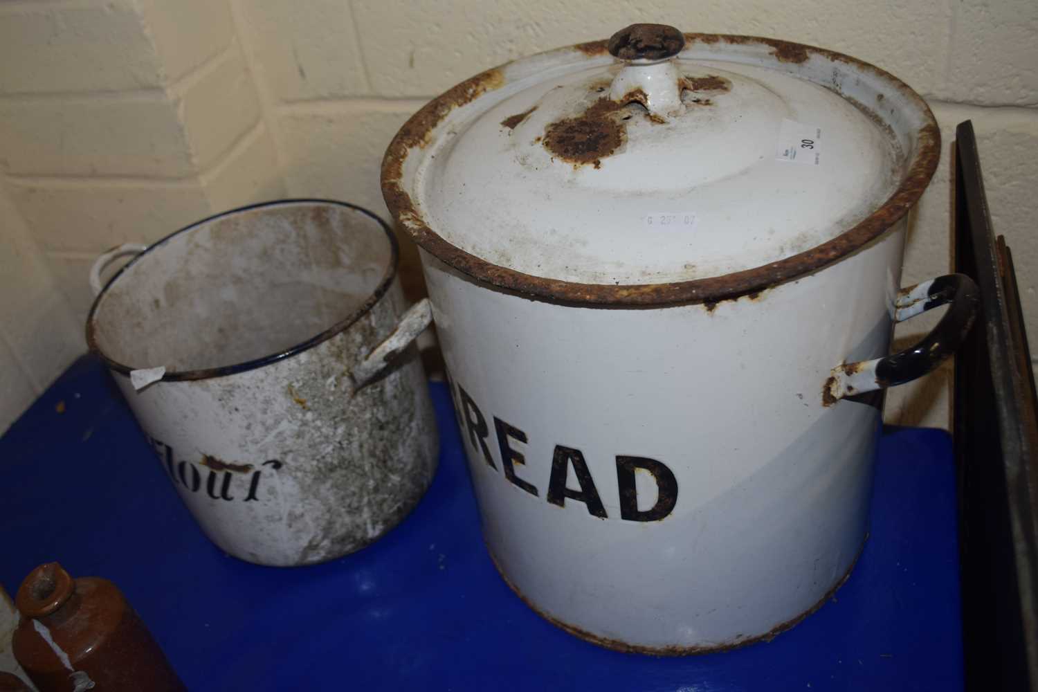 Vintage enamel bread bin and a similar flour bin