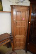 19th Century pine floor standing corner cabinet with two panelled doors and a shelved interior