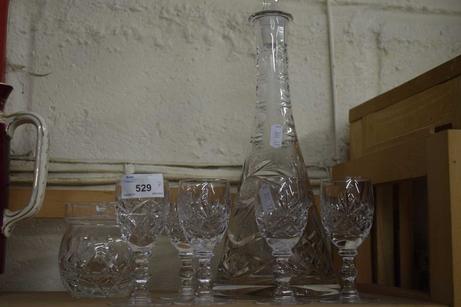 Clear cut glass decanter together with further preserve pot and sherry glasses