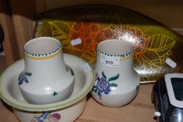 Mixed Lot: Poole pottery wares comprising a spear dish, pair of vases and a small bowl (4)