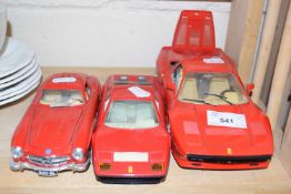 Two toy Ferrari's plus one other (3)