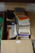 Box of books and travel guides