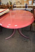 Painted oval dining table