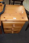 Pine three drawer bedside cabinet