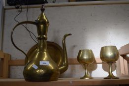 Mixed Lot: Brass Middle Eastern coffee pot together with further goblets and trays