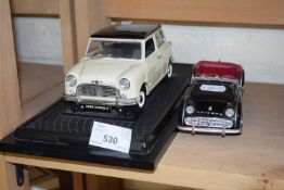 Model Morris Mini Cooper plus one other