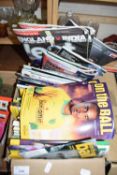 Box of Norwich City football programs and range of modern rugby programs