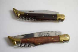 Two Laguiole penknives with wooden handles