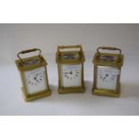Three brass carriage clocks