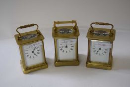 Three brass carriage clocks