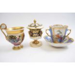 Group of porcelain wares including Dresden Meissen style cup and saucer, further Paris style cup and
