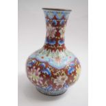 Chinese Cloisonne vase decorated with a geometric design and scrolling foliage, 19cm high