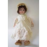 Bisque headed doll by William Goebel, marked 120, in original clothing