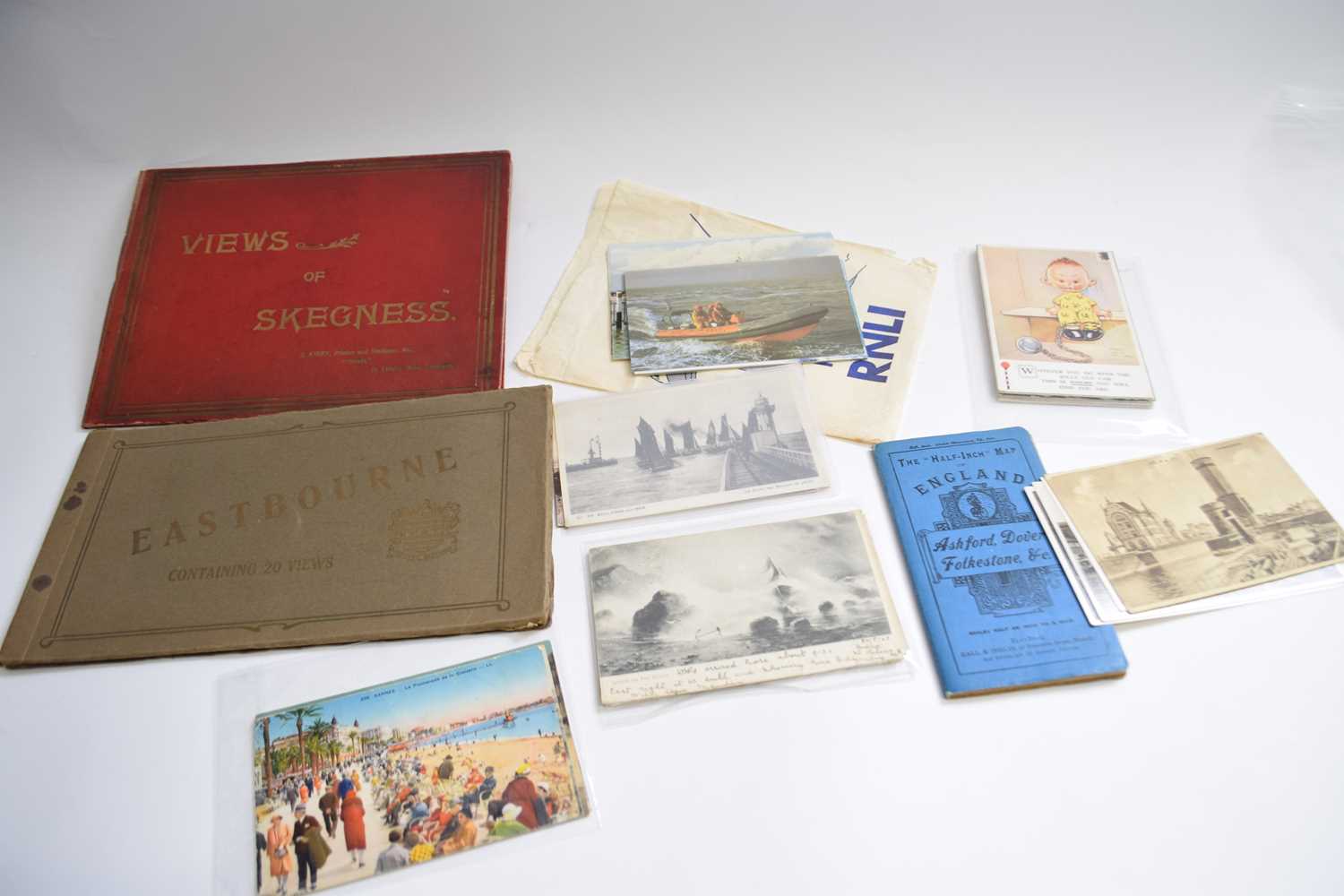 Tourist guide with views of Skegness, also Eastbourne and a number of postcards and small map for