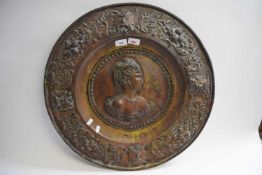 Large Dutch circular embossed wall plaque with female cameo, 58cm wide