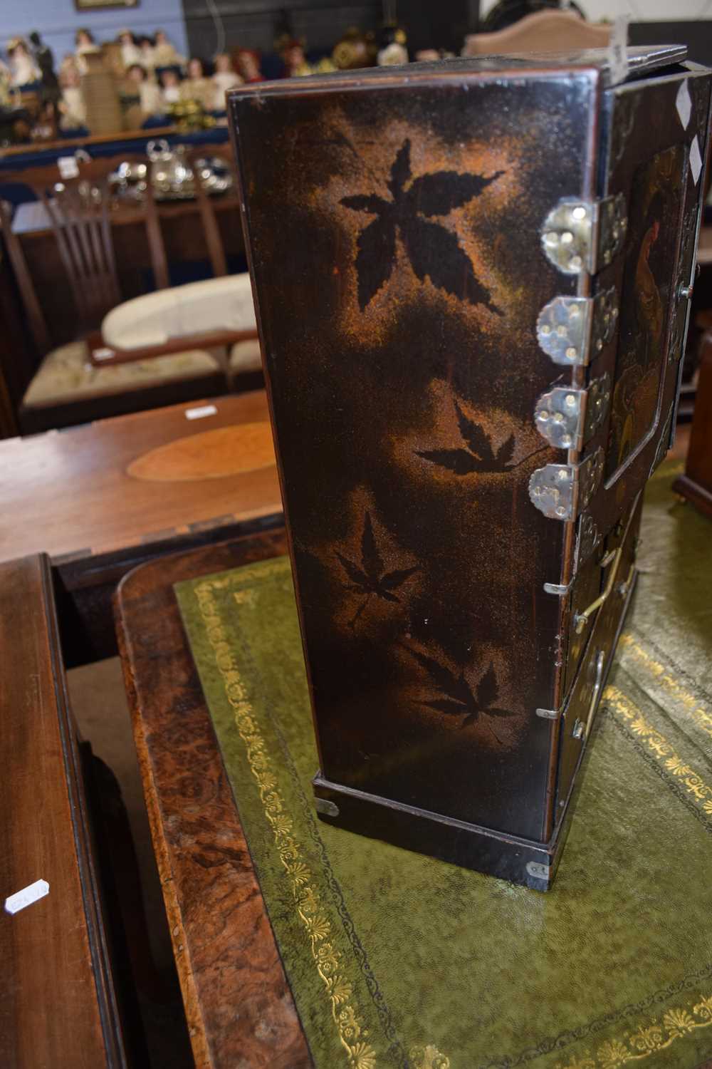 Late 19th or early 20th Century Oriental lacquered table top cabinet with two panelled doors opening - Image 3 of 3