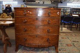 19th Century mahogany bow front chest with two short and three long drawers with turned knob handles