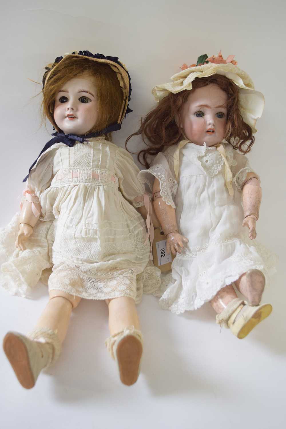 Two dolls, one maked SFBJ number 301