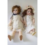 Two dolls, one maked SFBJ number 301