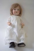 German bisque headed doll marked K Mengers, Germany, in original clothing