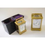 Two brass carriage clocks, one with original case