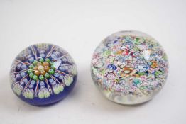 Two paperweights, one Perthshire with blue and green canes