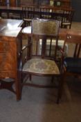 Edwardian mahogany framed and inlaid armchair with floral upholstery