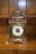 Late 19th Century bracket or mantel clock, the architectural hardwood case with extensive applied