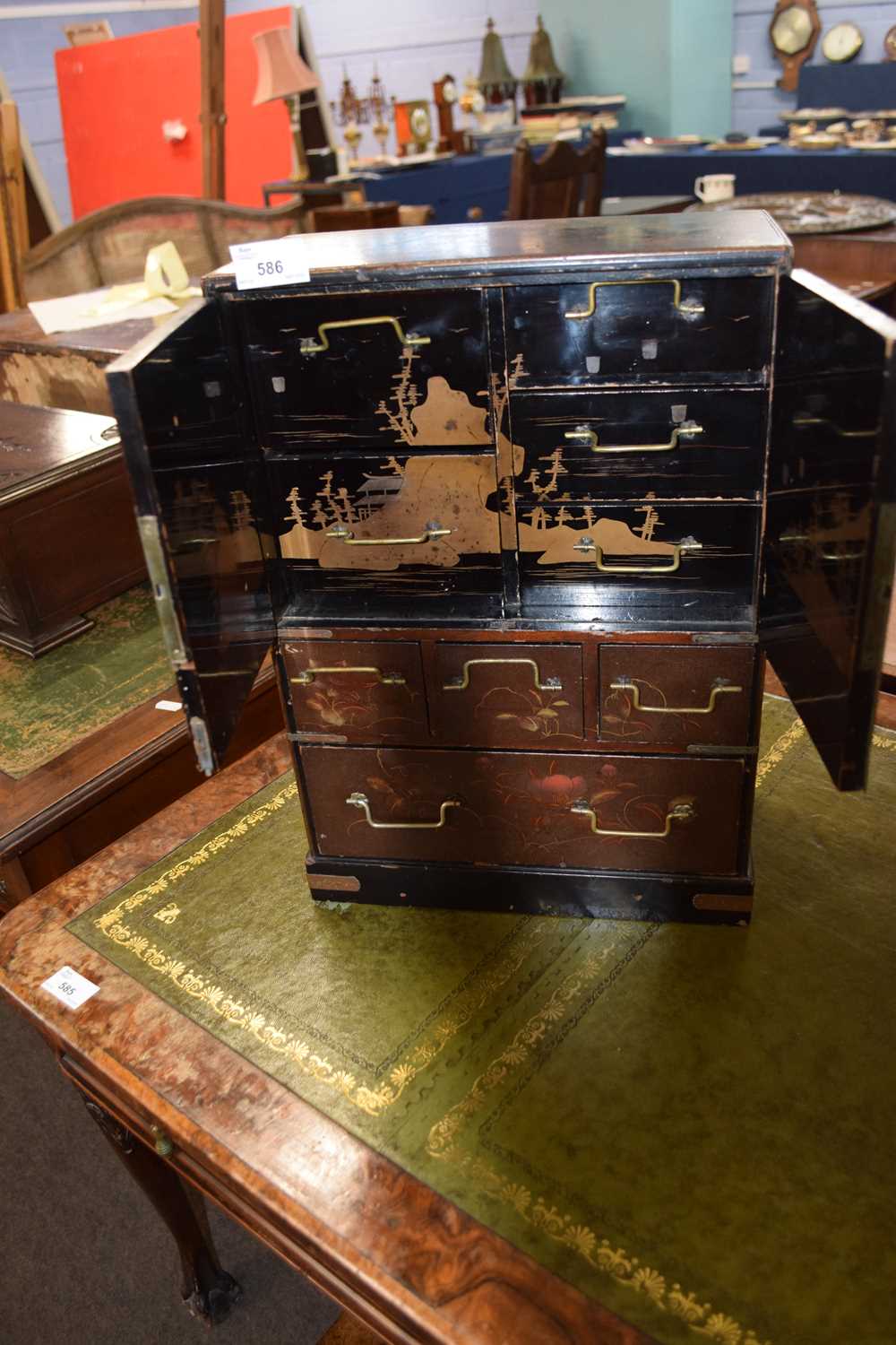 Late 19th or early 20th Century Oriental lacquered table top cabinet with two panelled doors opening - Image 2 of 3