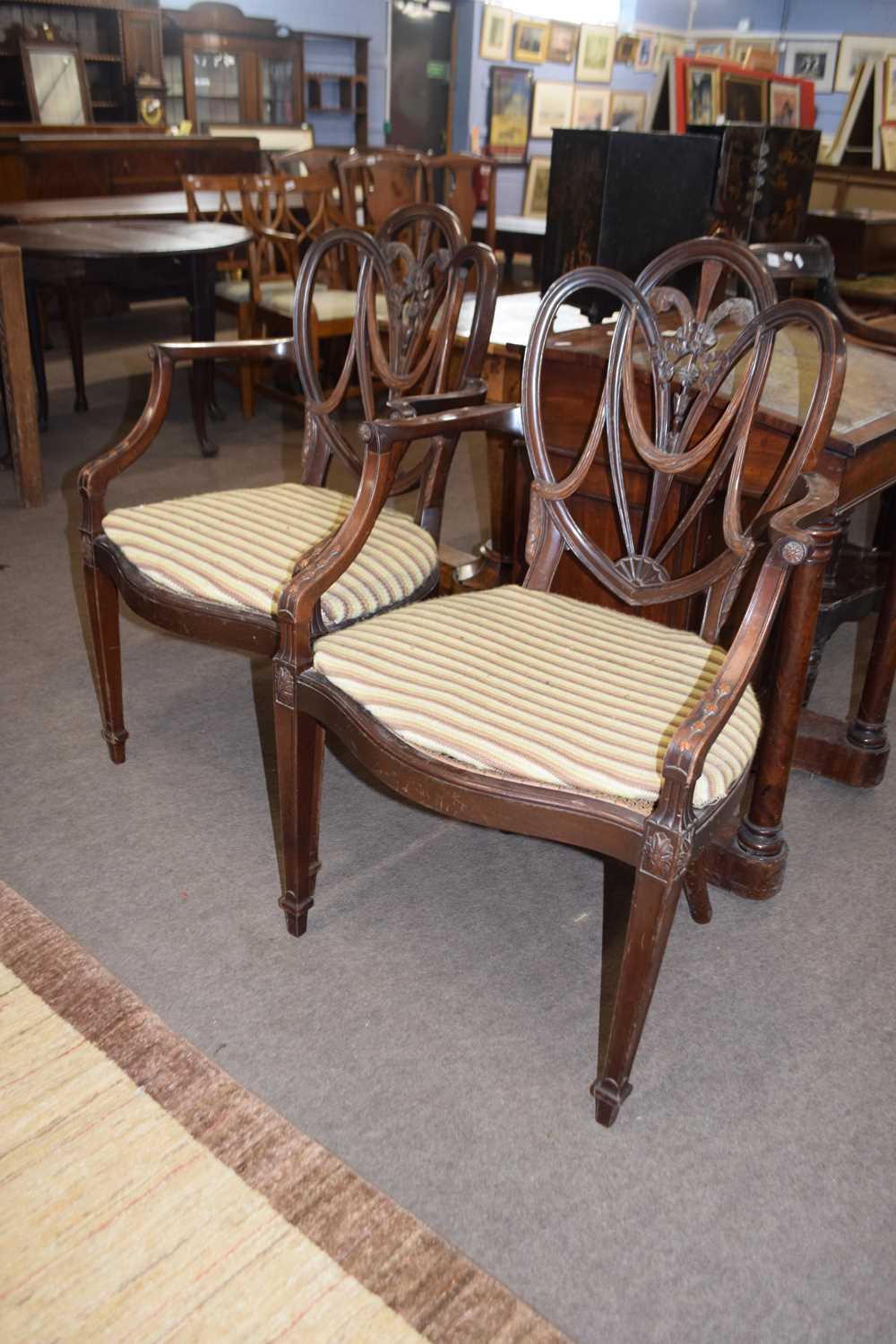 Pair of Georgian style mahogany armchairs with shaped back with fleur de lis decoration over cane - Image 2 of 2