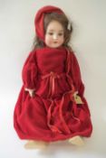 German bisque headed doll in original clothing, the head marked K & H number 250