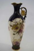 Large continental porcelain ewer probably Royal Bonn decorated with flowers, 44cm high