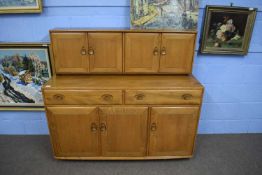 Ercol light elm sideboard, 136cm wide x 124cm high x 46cm deepSome minor surface marks but appears