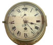 Ships clock in brass case with second dial and key