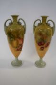 Pair of porcelain vases painted with fruit in Royal Worcester style, 30cm high