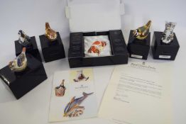 Group of six Royal Crown Derby paperweights with original boxes including a puppy, made for the