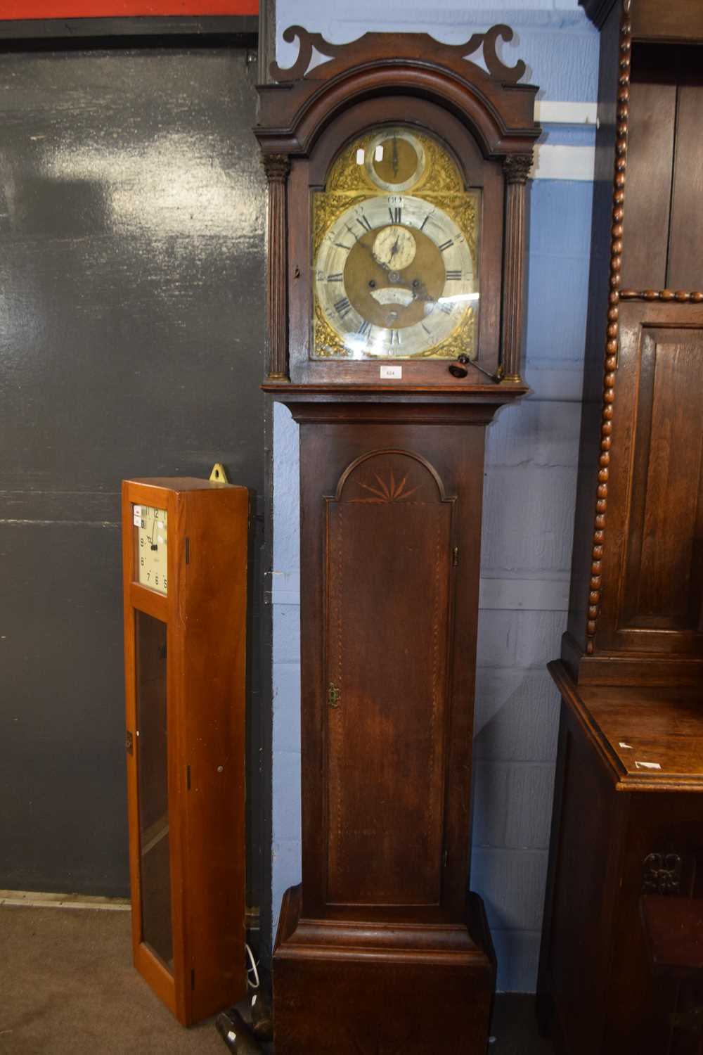 John Blumfield, Norwich, an 18th Century long case clock with arched brass and silvered dial with