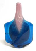 Mdina axehead vase decorated in shades of blue and pink with engraved signature to base, 18cm high