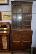 Small Georgian mahogany secretaire bookcase cabinet with moulded and dental cornice over two