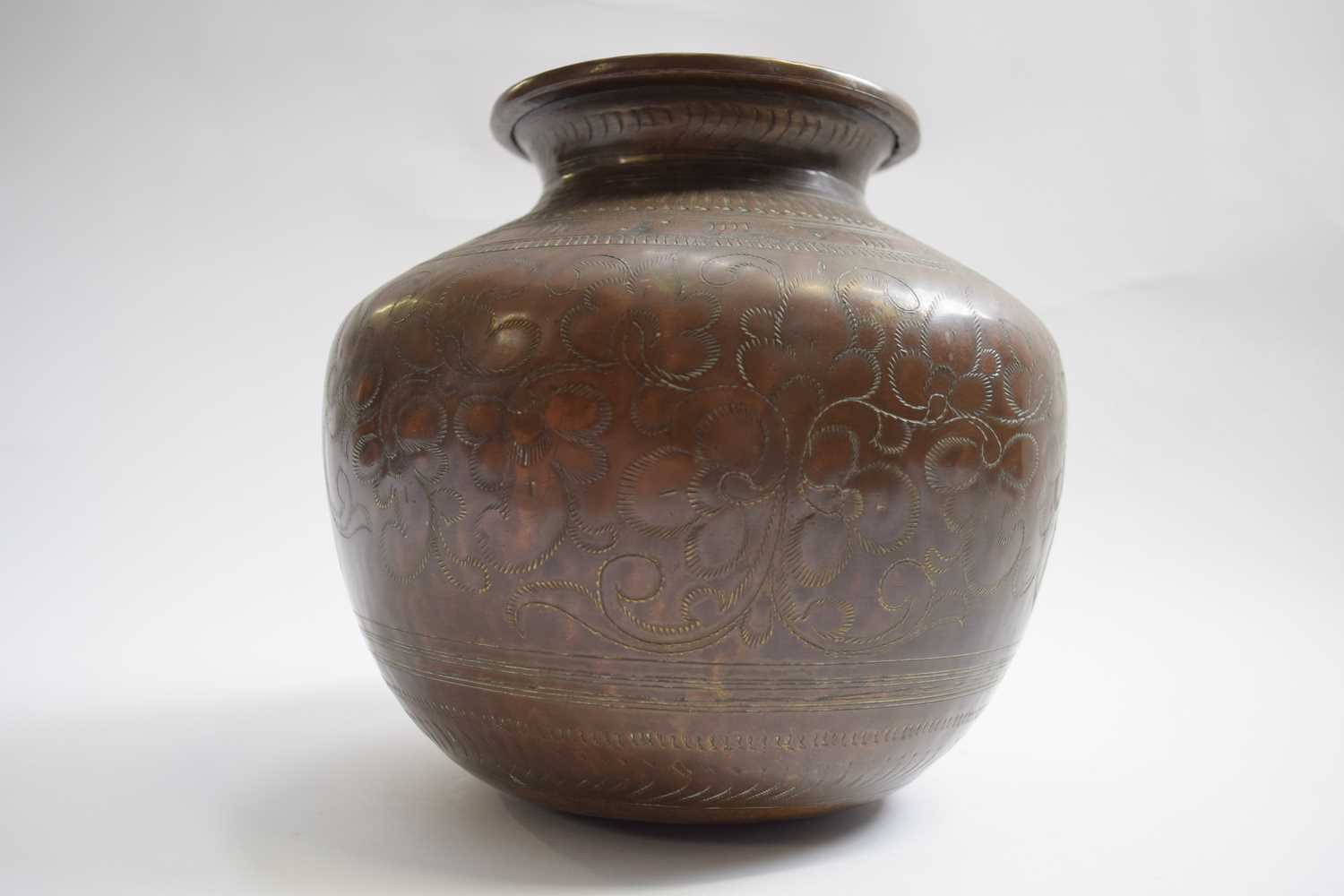 Copper pot with a incised foliage design, 17cm high - Image 2 of 4