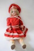 German bisque headed doll in original clothing