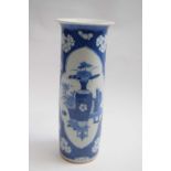 Chinese porcelain blue and white cylindrical vase decorated with panels of precious objects on a