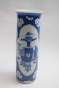 Chinese porcelain blue and white cylindrical vase decorated with panels of precious objects on a