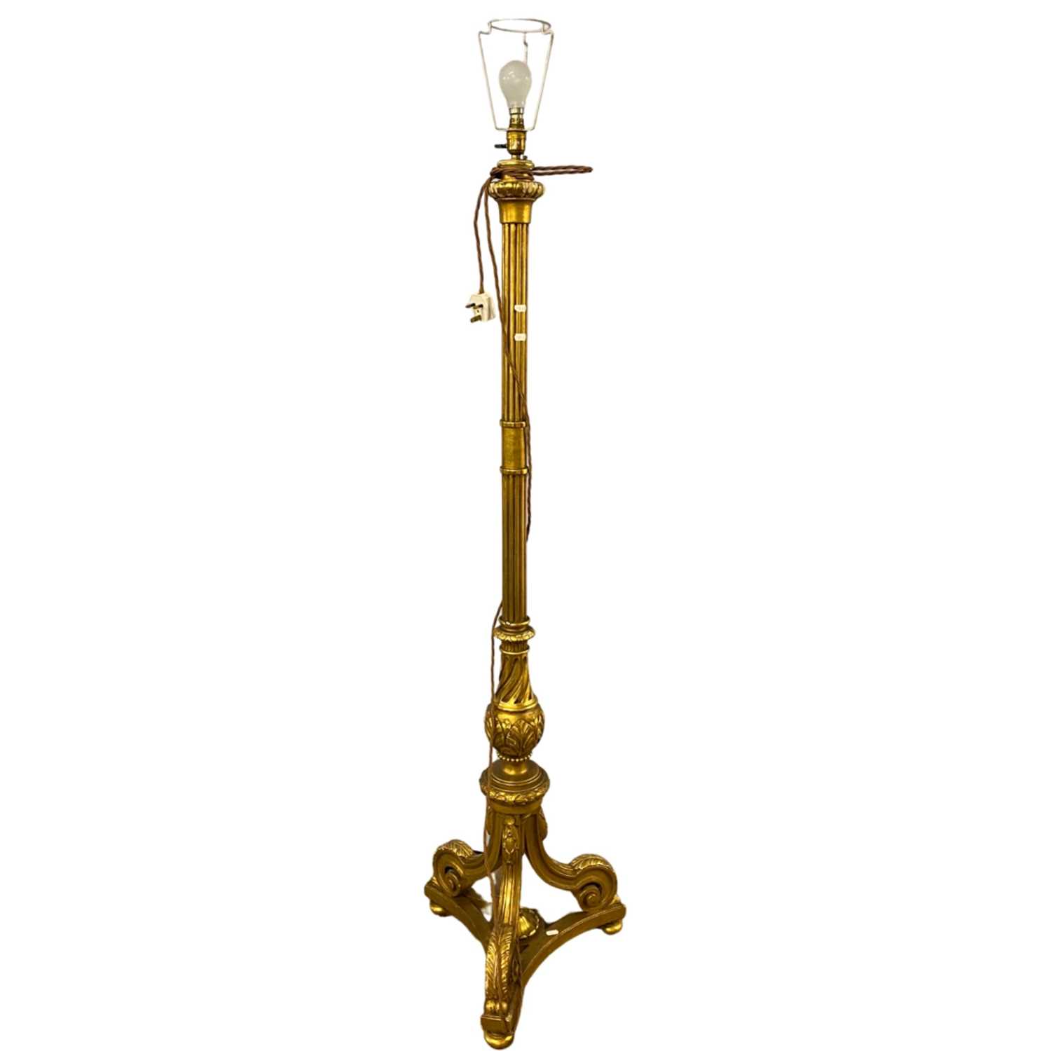 Early 20th Century ornate gilt wood standard lamp on three footed base, 185cm high including