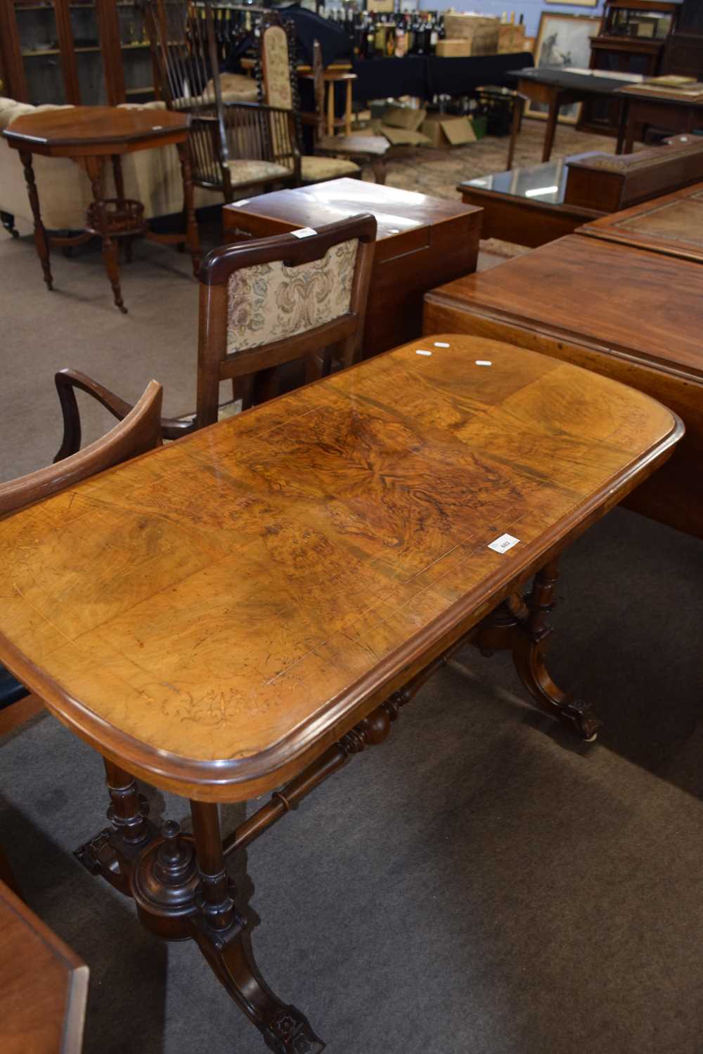 Victorian walnut veneered centre table raised on four turned supports with outswept legs with - Image 2 of 2