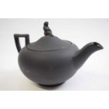 Wedgwood black basalt teapot with lady finial, early 20th Century (chip to spout)
