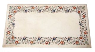India Agra marble table top of rectangular form, the border inlaid with a floral and vine design